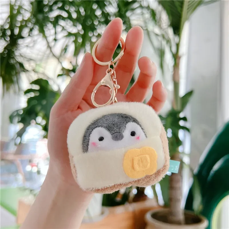 Globetrotter Penguin Plush Keychain - Image 13
