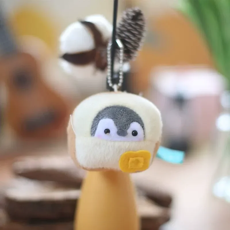 Globetrotter Penguin Plush Keychain - Image 17