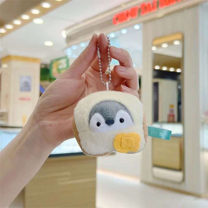 Globetrotter Penguin Plush Keychain - Image 23