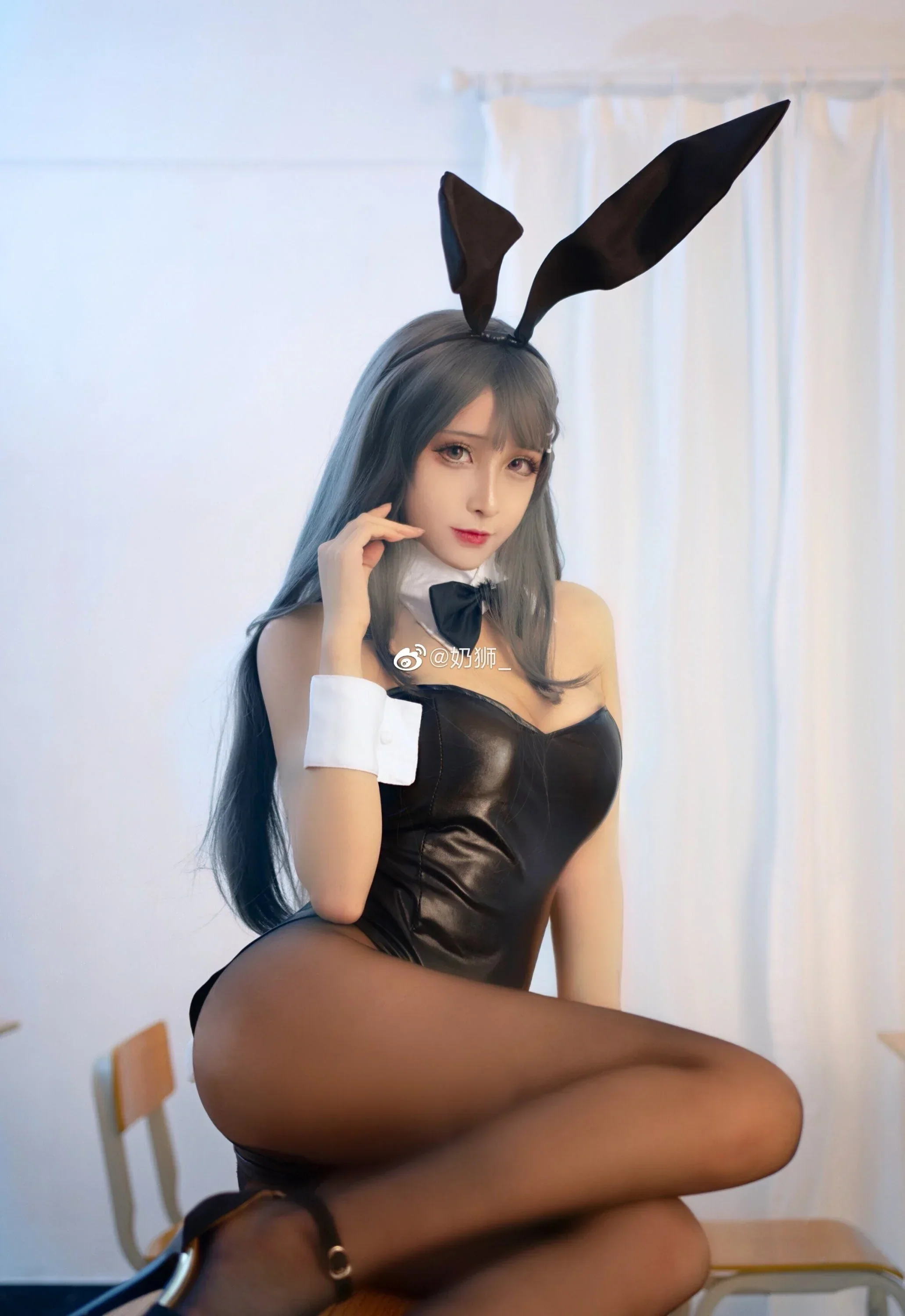 Playful Black Bunny Girl Cosplay - Image 24