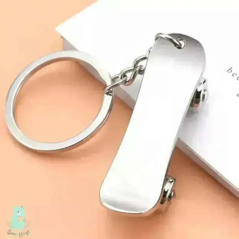 Rolling Radness Revolving Skateboard Keychain - Image 6